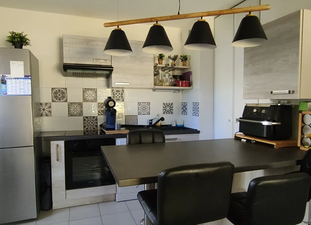 Bel appartement T2 avec terrasse et parking à Langon - Résidence sécurisée 