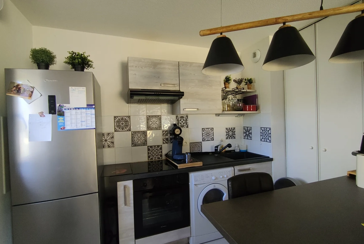 Bel appartement T2 avec terrasse et parking à Langon - Résidence sécurisée 