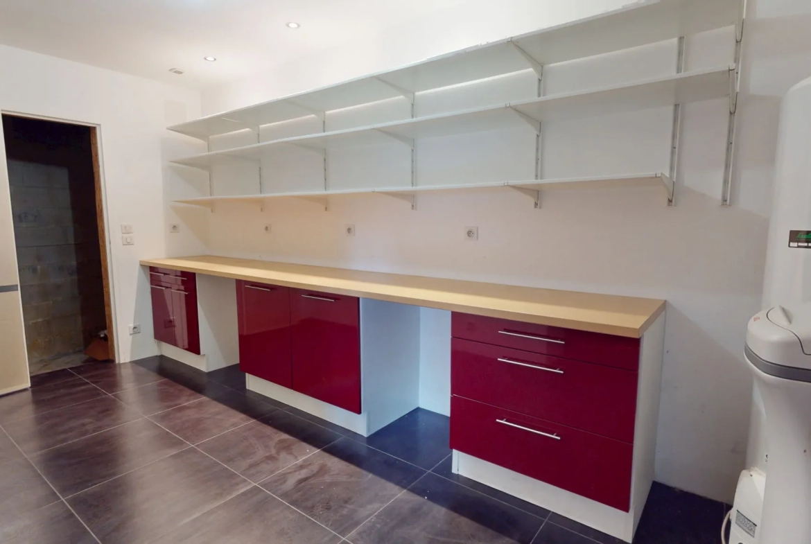 Maison en ossature bois de 130 m² à Evans avec terrasses et garage 