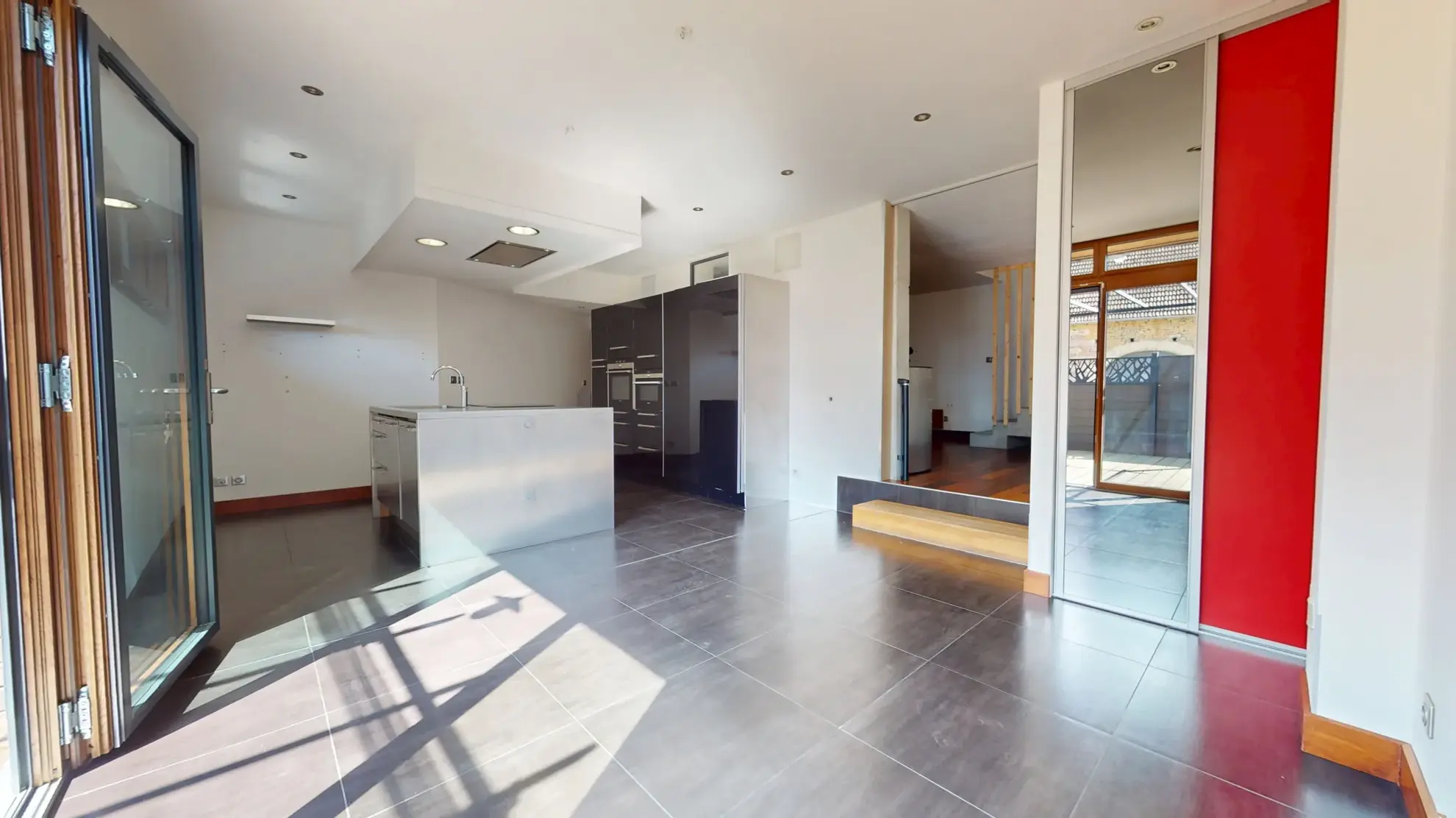 Maison en ossature bois de 130 m² à Evans avec terrasses et garage 