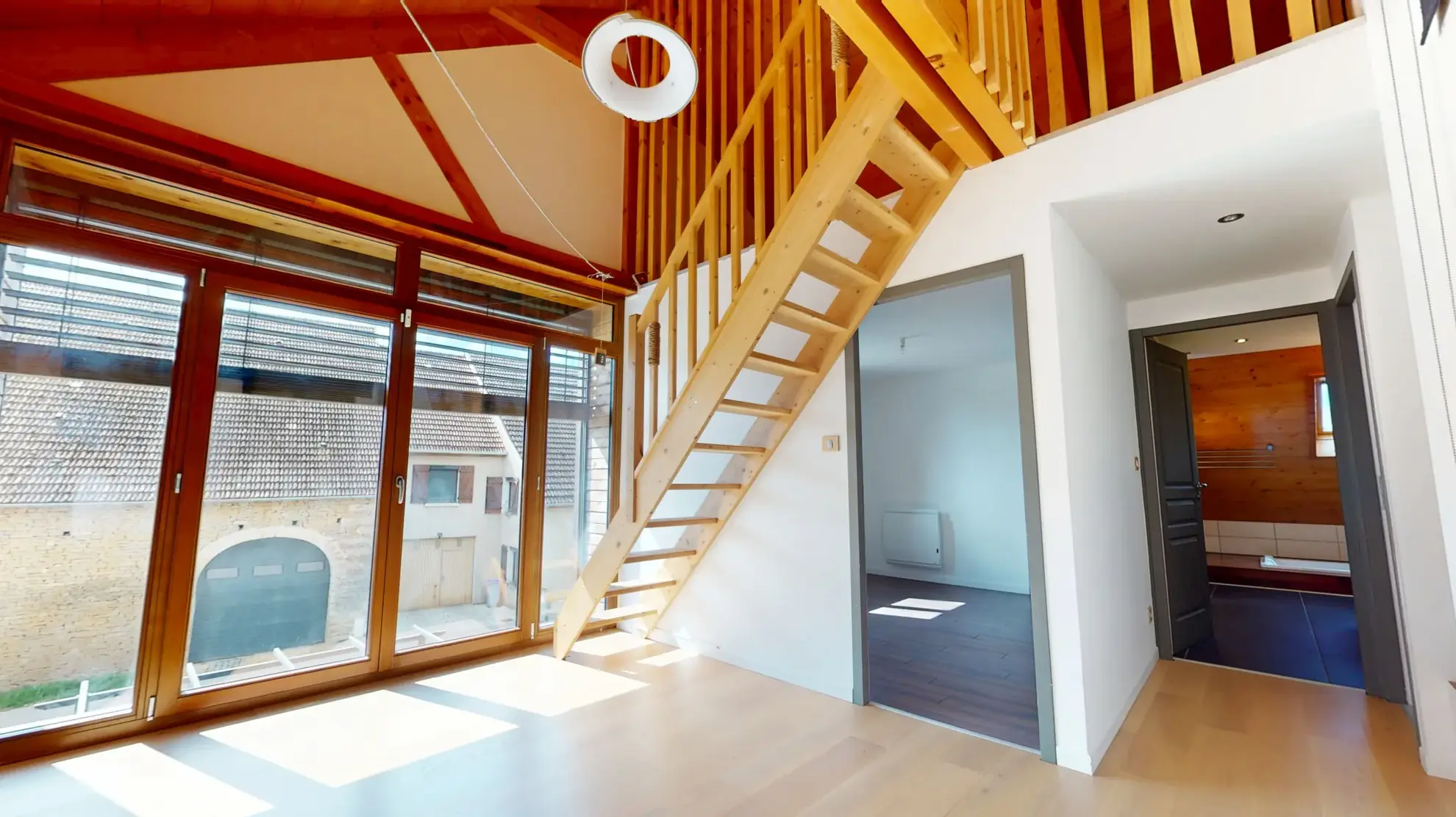 Maison en ossature bois de 130 m² à Evans avec terrasses et garage 