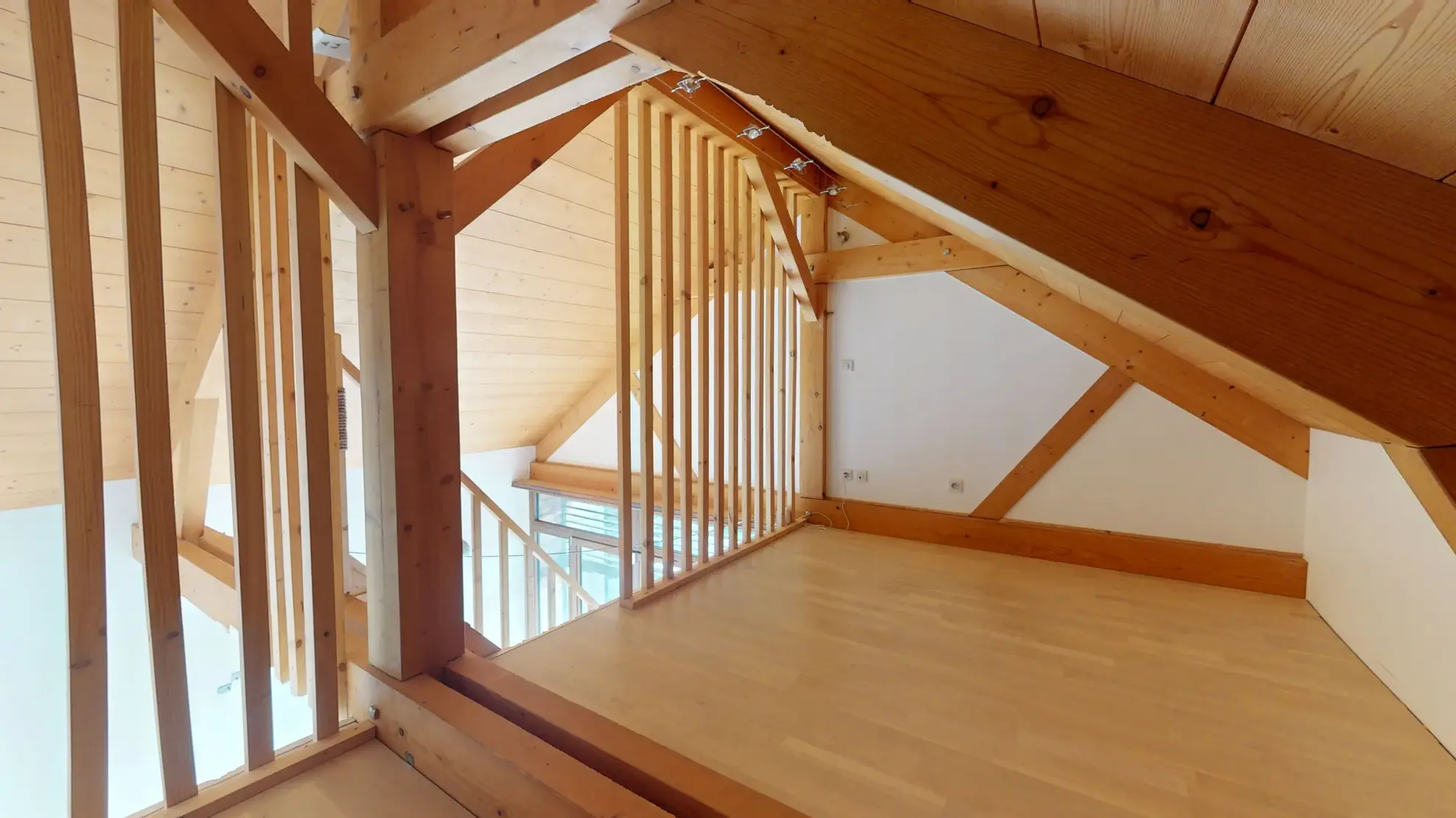 Maison en ossature bois de 130 m² à Evans avec terrasses et garage 