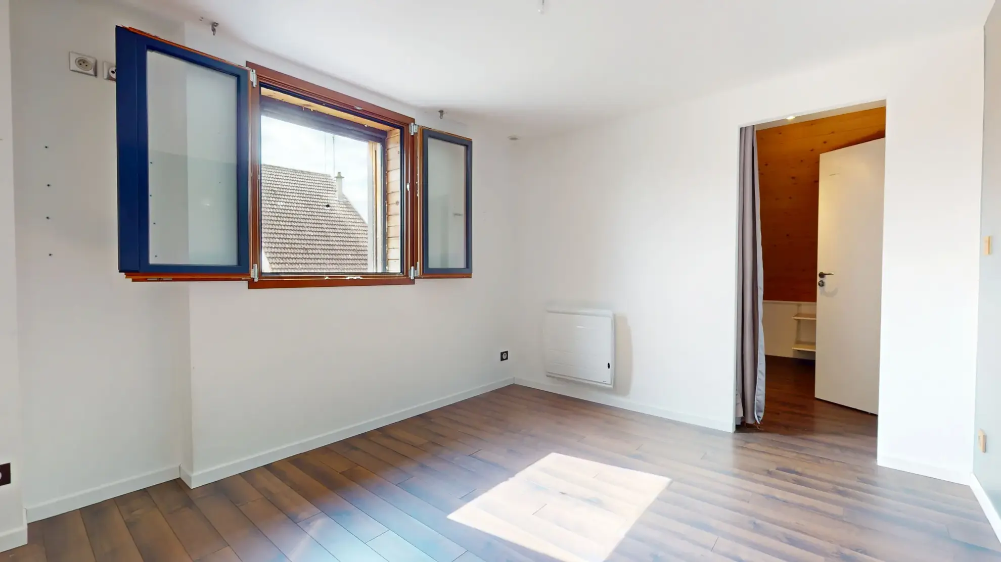 Maison en ossature bois de 130 m² à Evans avec terrasses et garage 