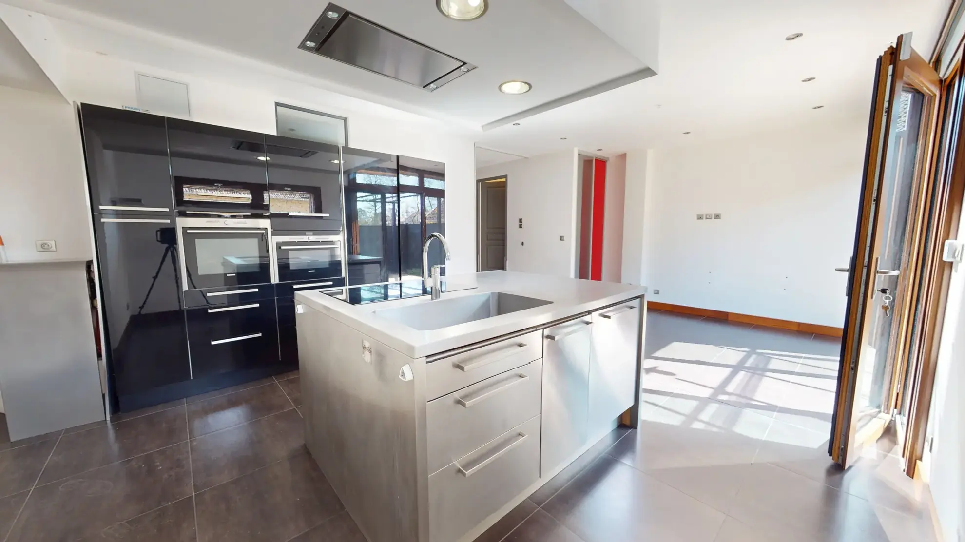 Maison en ossature bois de 130 m² à Evans avec terrasses et garage 