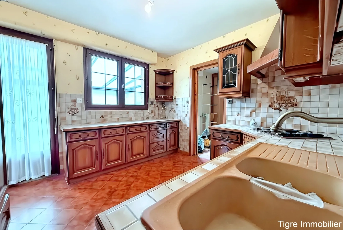 Maison individuelle à Jeumont avec 4 chambres, véranda et sous-sol - Secteur privilégié 