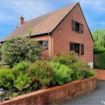 Maison individuelle à Jeumont avec 4 chambres, véranda et sous-sol - Secteur privilégié