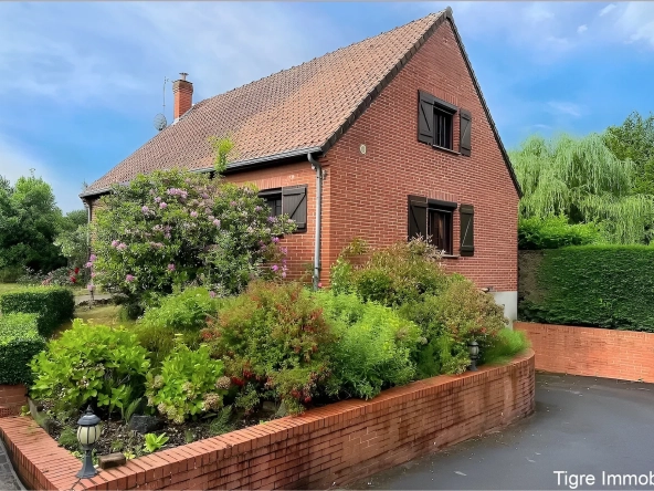 Maison individuelle à Jeumont avec 4 chambres, véranda et sous-sol - Secteur privilégié