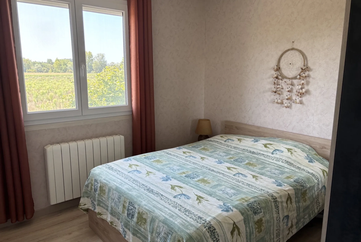 Maison individuelle à vendre de 120 m² à Ste Bazeille avec grand jardin et potentiel d'extension 