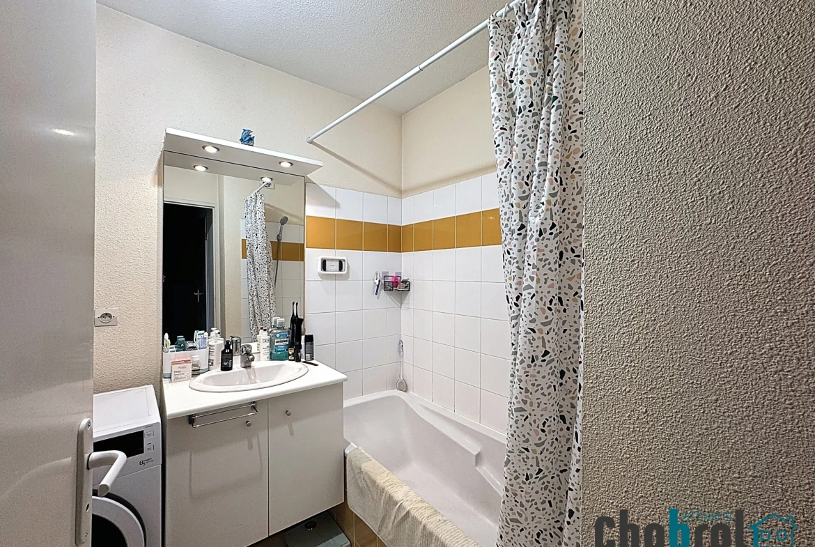 Appartement T2 loué à Fronton avec parking et balcon – Investissement idéal 