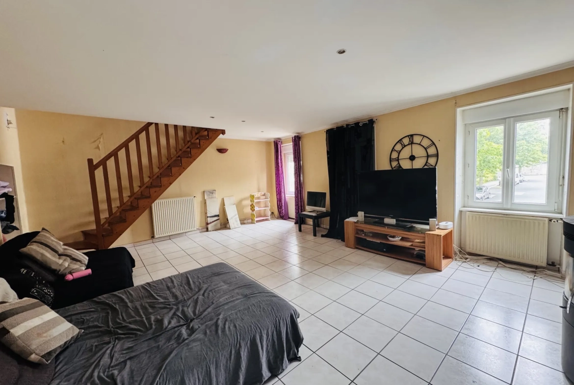 Appartement atypique de 198 m² avec jardin et garage au centre de Plabennec 