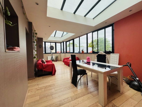 Appartement atypique de 198 m² avec jardin et garage au centre de Plabennec