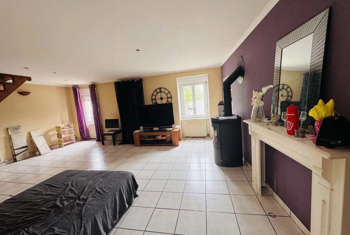 Appartement atypique de 198 m² avec jardin et garage au centre de Plabennec 