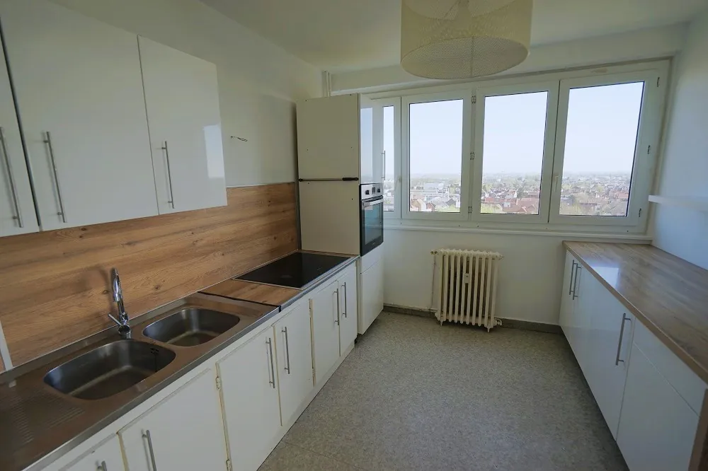 Appartement T3 avec balcon à Hem – 65 m², résidence sécurisée 