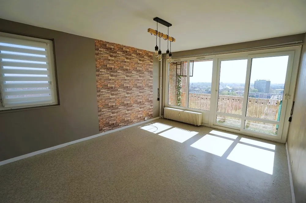 Appartement T3 avec balcon à Hem – 65 m², résidence sécurisée 