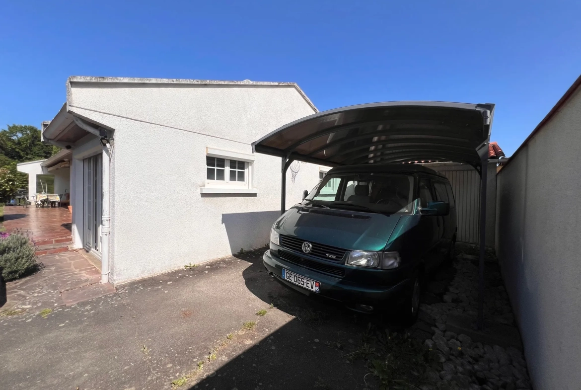 Magnifique maison de plain-pied à Tarbes avec grand jardin et équipements modernes 