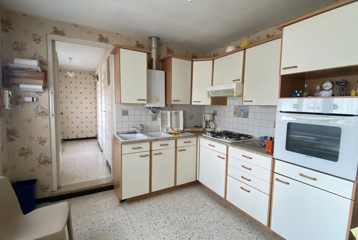 Maison à rénover de 75 m² avec jardin et garage à Trith Saint Léger 
