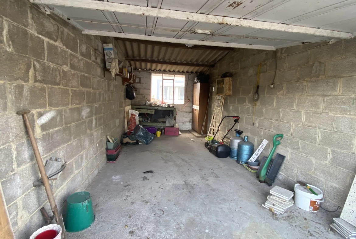 Maison à rénover de 75 m² avec jardin et garage à Trith Saint Léger 