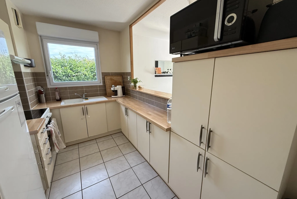 Appartement T3 avec jardin privé et 2 parkings à Mérignac 