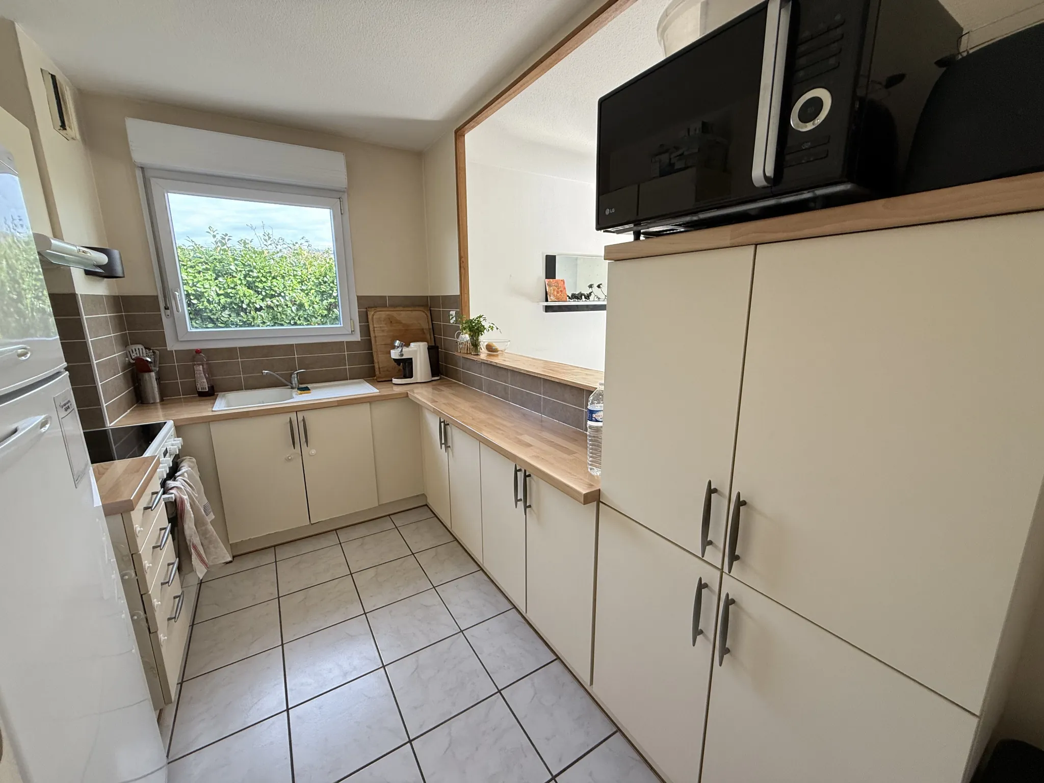 Appartement T3 avec jardin privé et 2 parkings à Mérignac 
