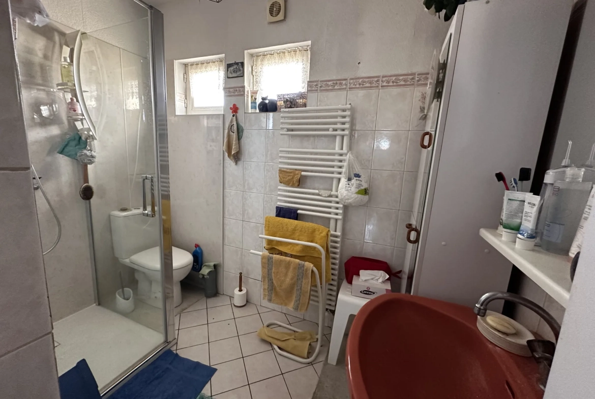 Maison à vendre avec jardin et garage à Carcassonne 