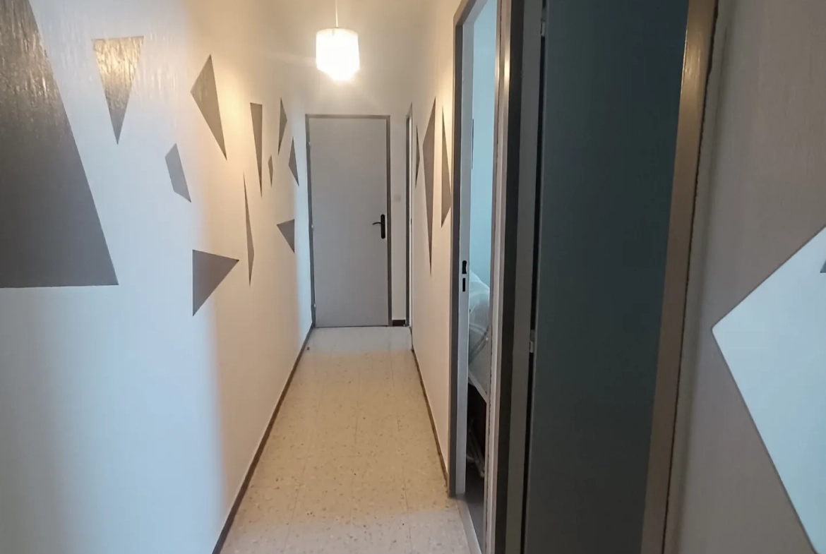 Appartement 3 pièces avec garage et cave au centre du Chambon-Feugerolles 