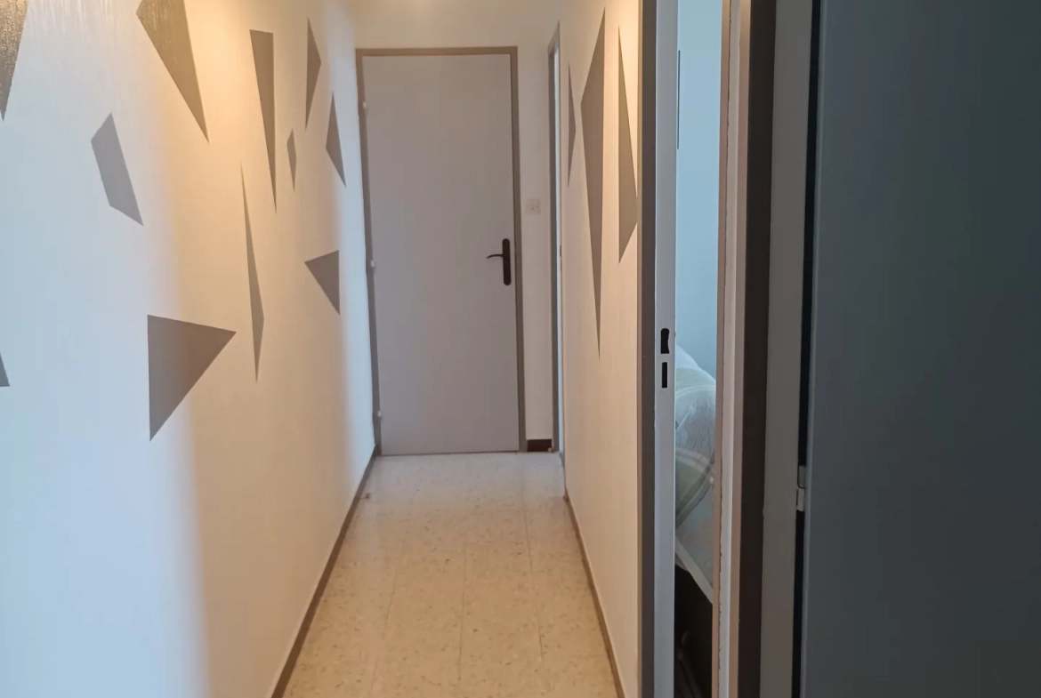 Appartement 3 pièces avec garage et cave au centre du Chambon-Feugerolles 