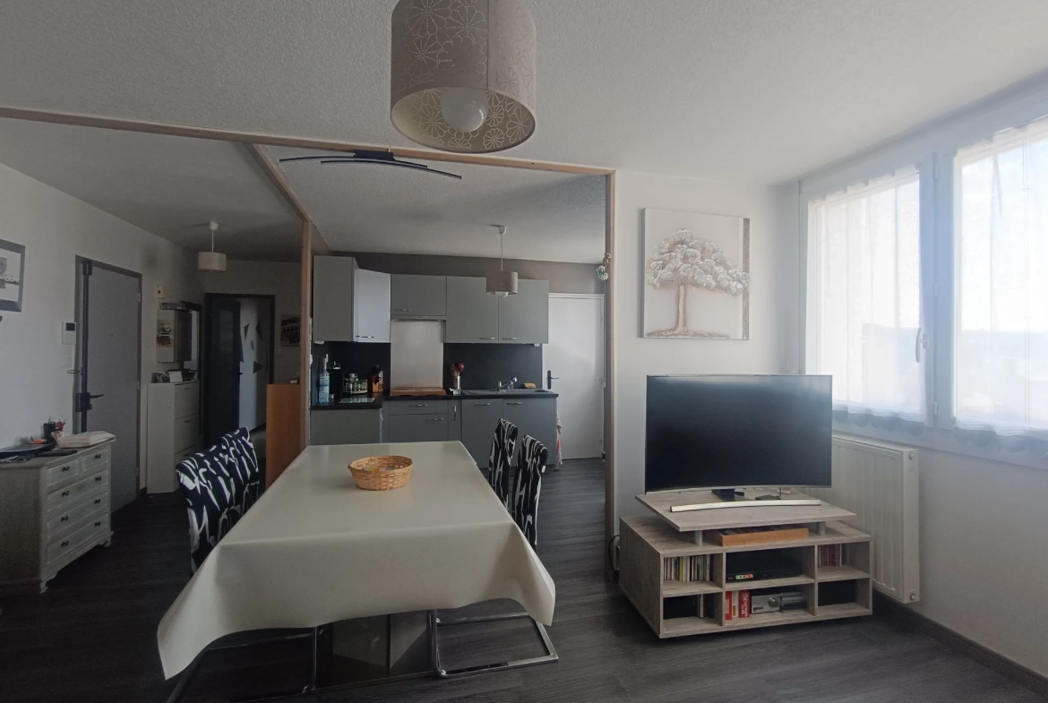 Appartement 3 pièces avec garage et cave au centre du Chambon-Feugerolles 