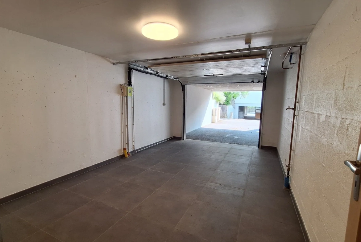 A vendre duplex avec jardin et garage à Morschwiller le Bas 