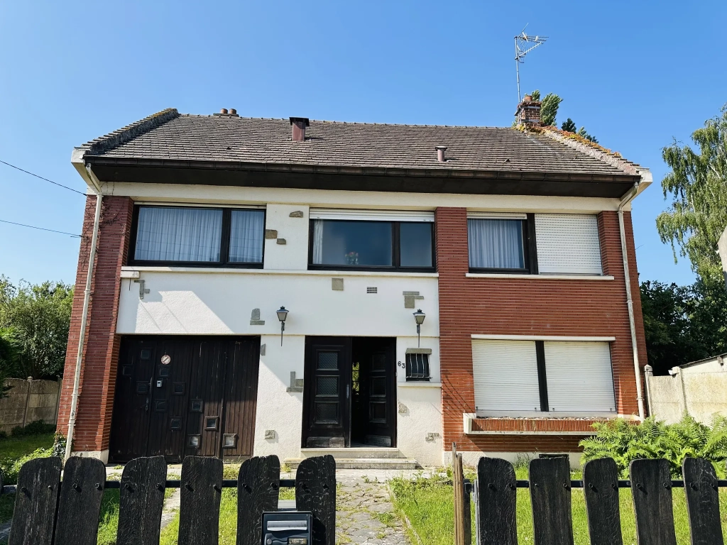 Belle maison familiale à Caudry avec 5 chambres, jardin et grand potentiel de rénovation
