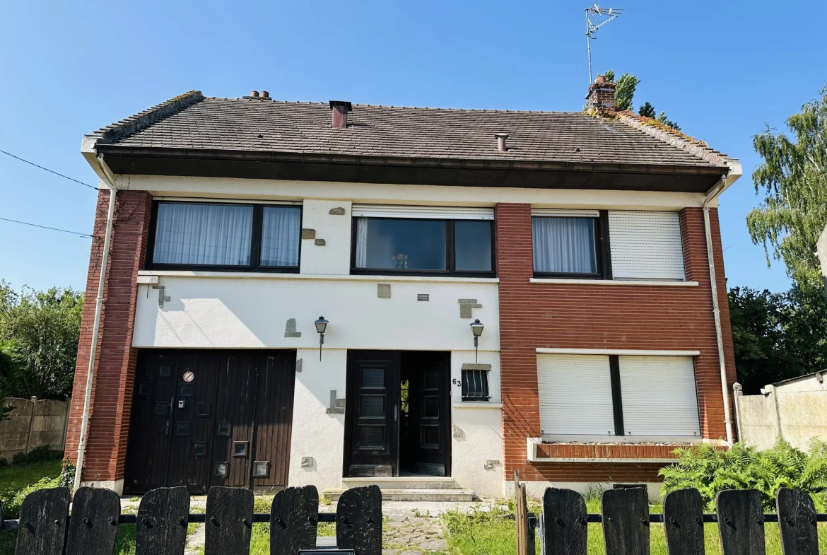 Belle maison familiale à Caudry avec 5 chambres, jardin et grand potentiel de rénovation 