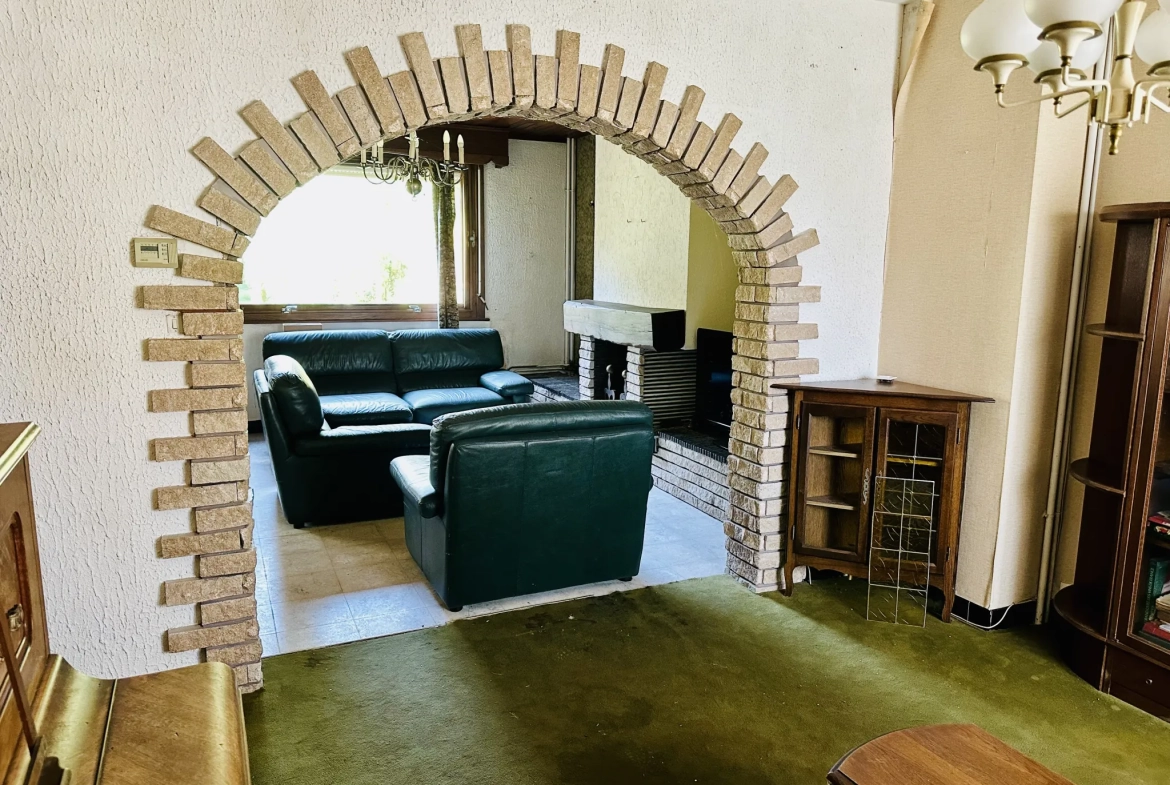 Belle maison familiale à Caudry avec 5 chambres, jardin et grand potentiel de rénovation 