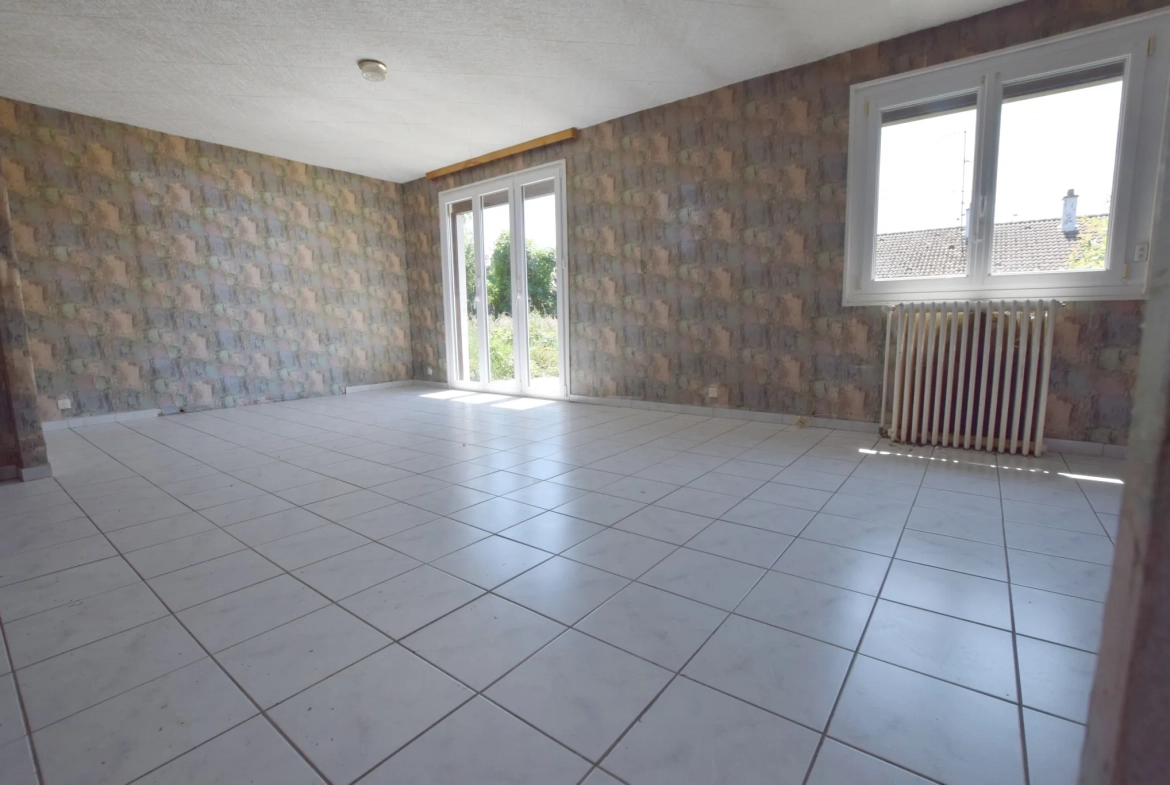 Maison de plain-pied à rénover à Audincourt avec jardin et potentiel 