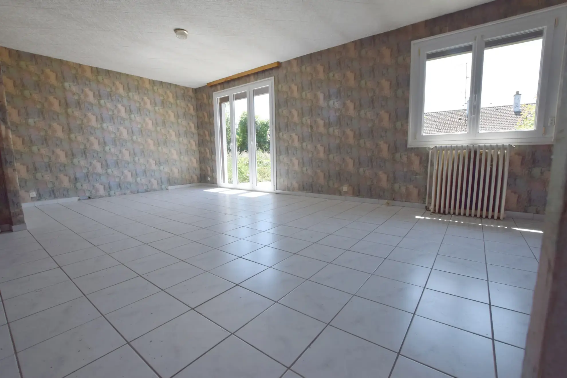 Maison de plain-pied à rénover à Audincourt avec jardin et potentiel 
