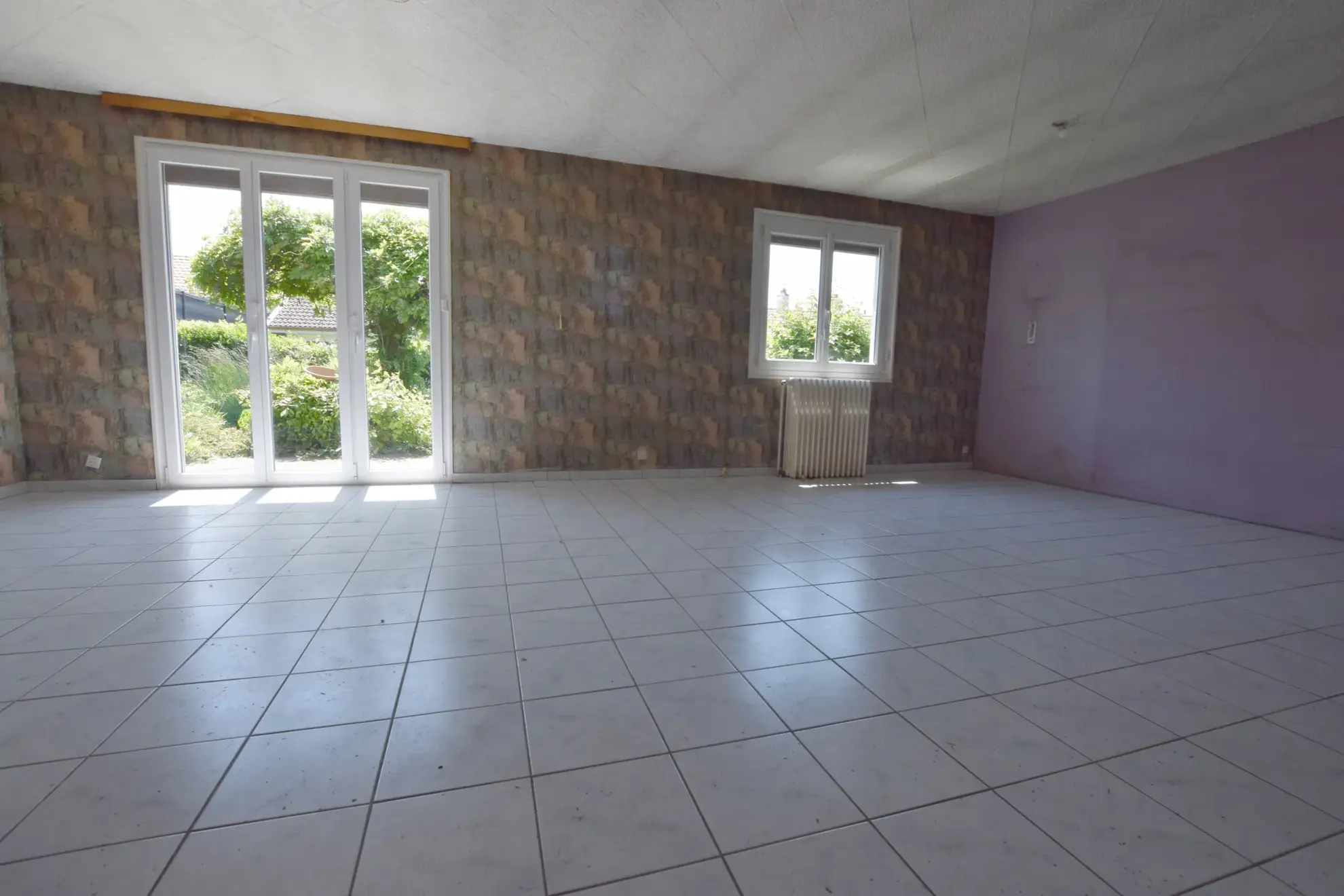 Maison de plain-pied à rénover à Audincourt avec jardin et potentiel 