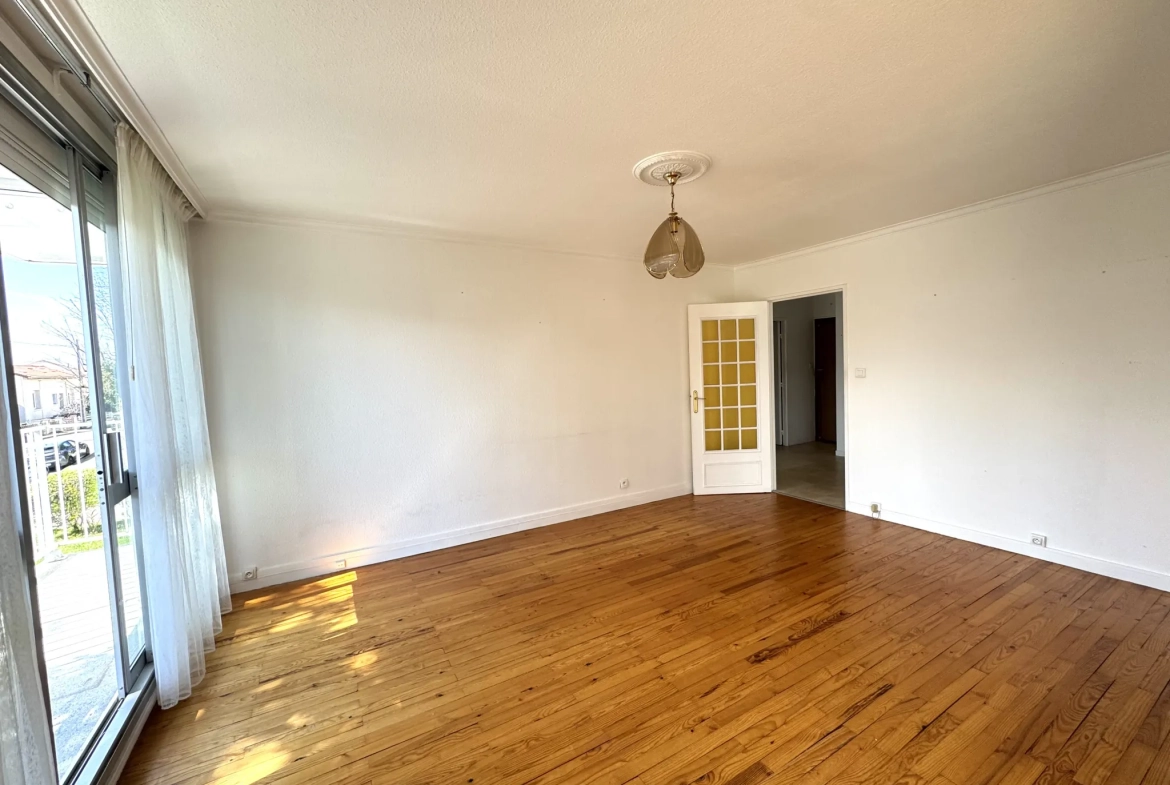 Appartement F4 avec balcon, cave et parking à Saint-Étienne Villeboeuf le Haut 