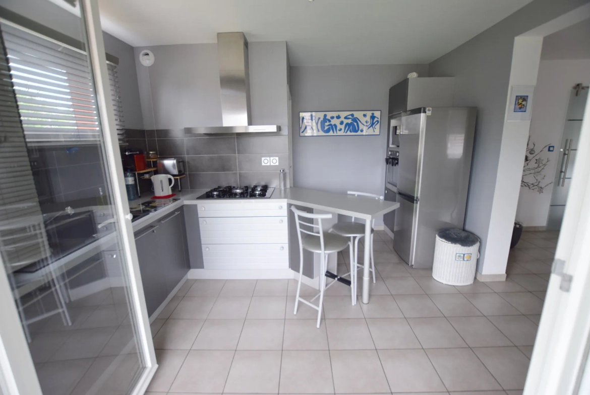 Appartement contemporain F5 avec terrasse et garage à Grand-Charmont 