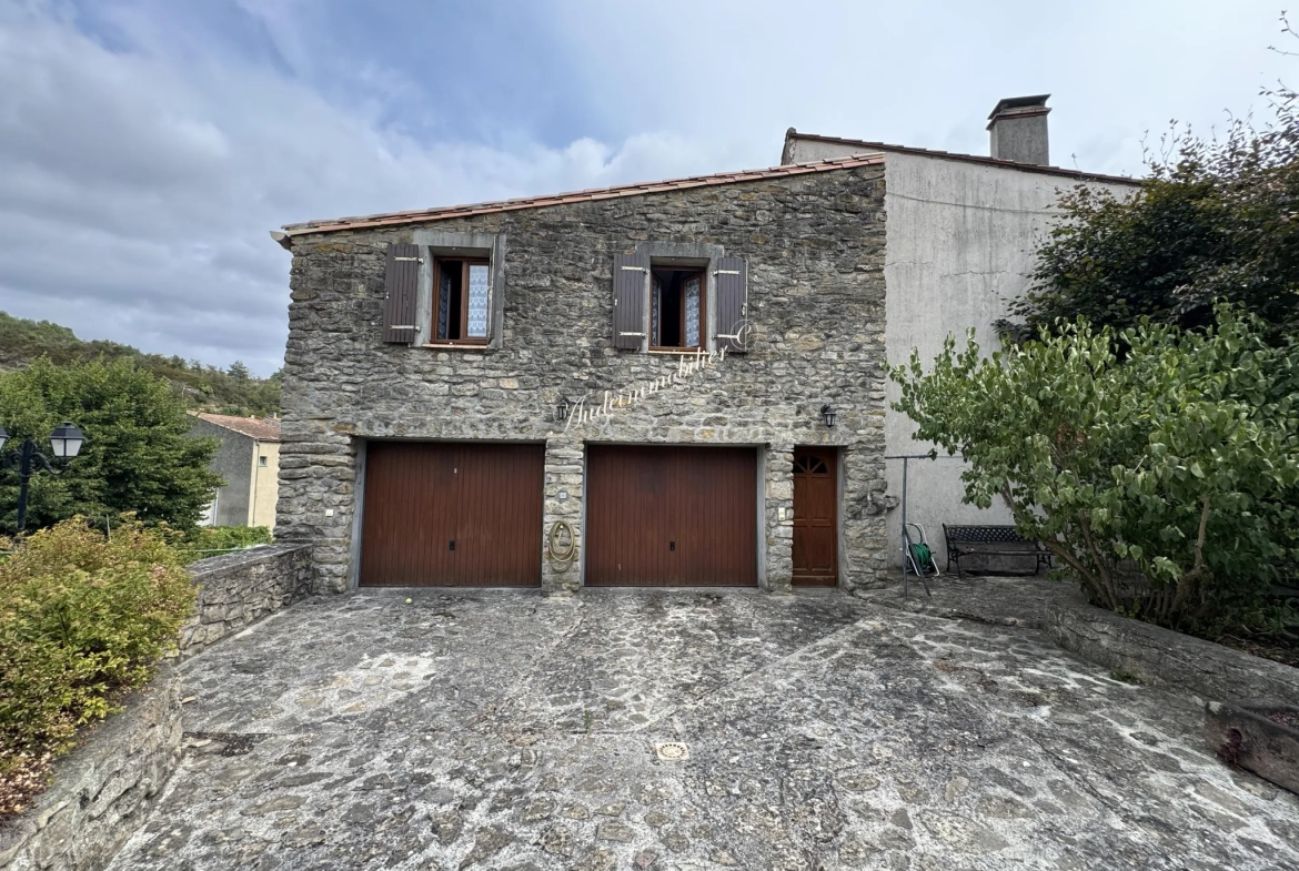 Maison spacieuse avec jardin, garage et appartement à Couiza dans l'Aude 
