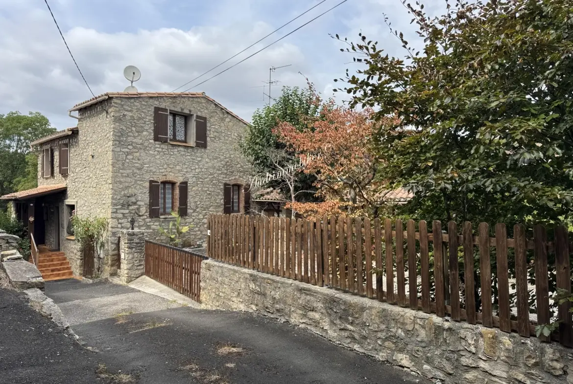 Maison spacieuse avec jardin, garage et appartement à Couiza dans l'Aude 