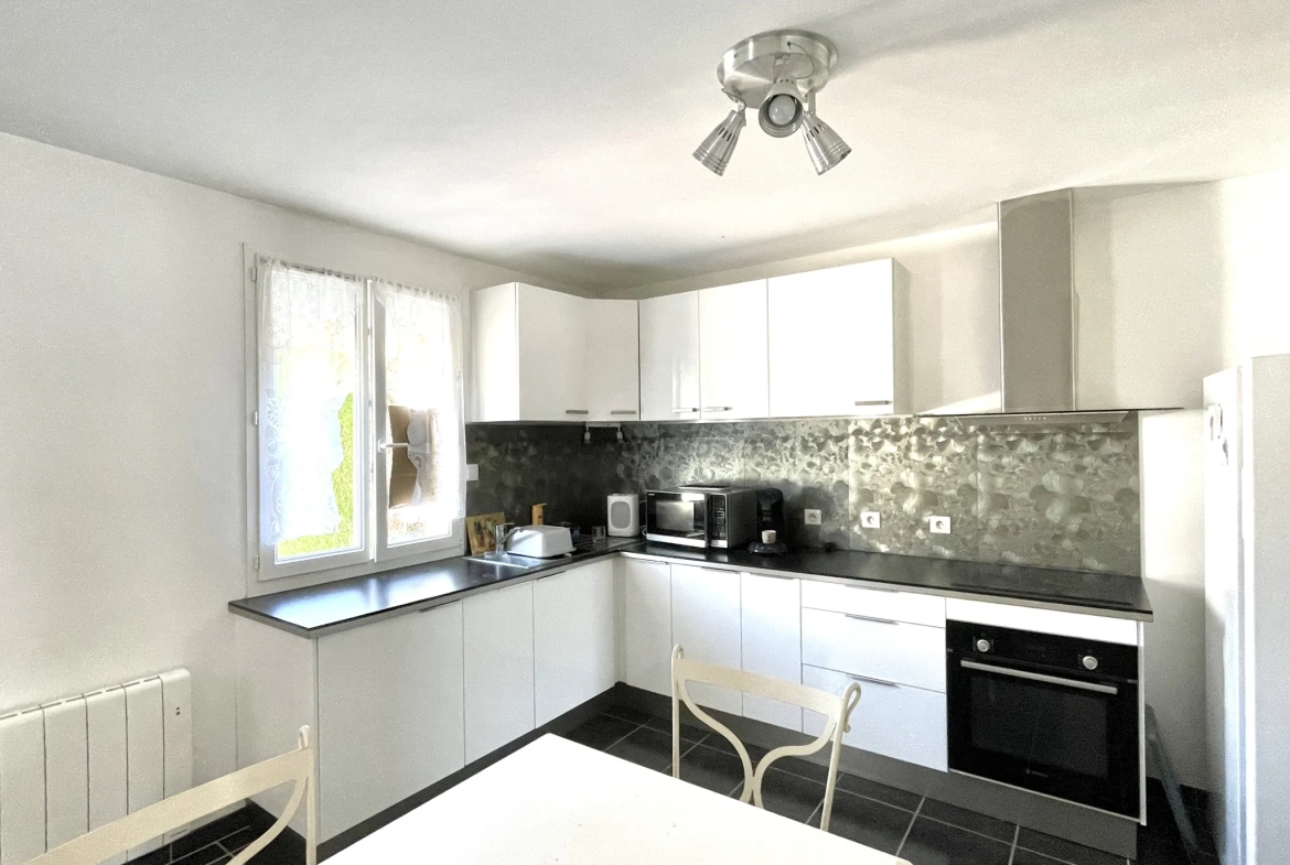 Maison individuelle rénovée proche de Saint-Quentin avec jardin et garage 