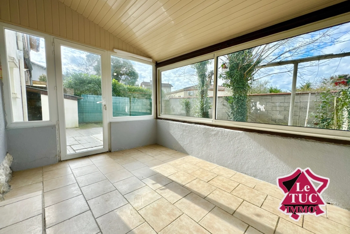 Maison 3 chambres avec garage, jardin et véranda à Villeneuve-sur-Lot 