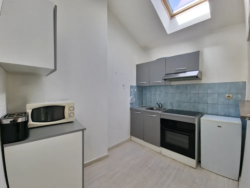 Appartement 3 pièces à vendre à Aurillac au dernier étage, proche des commerces 