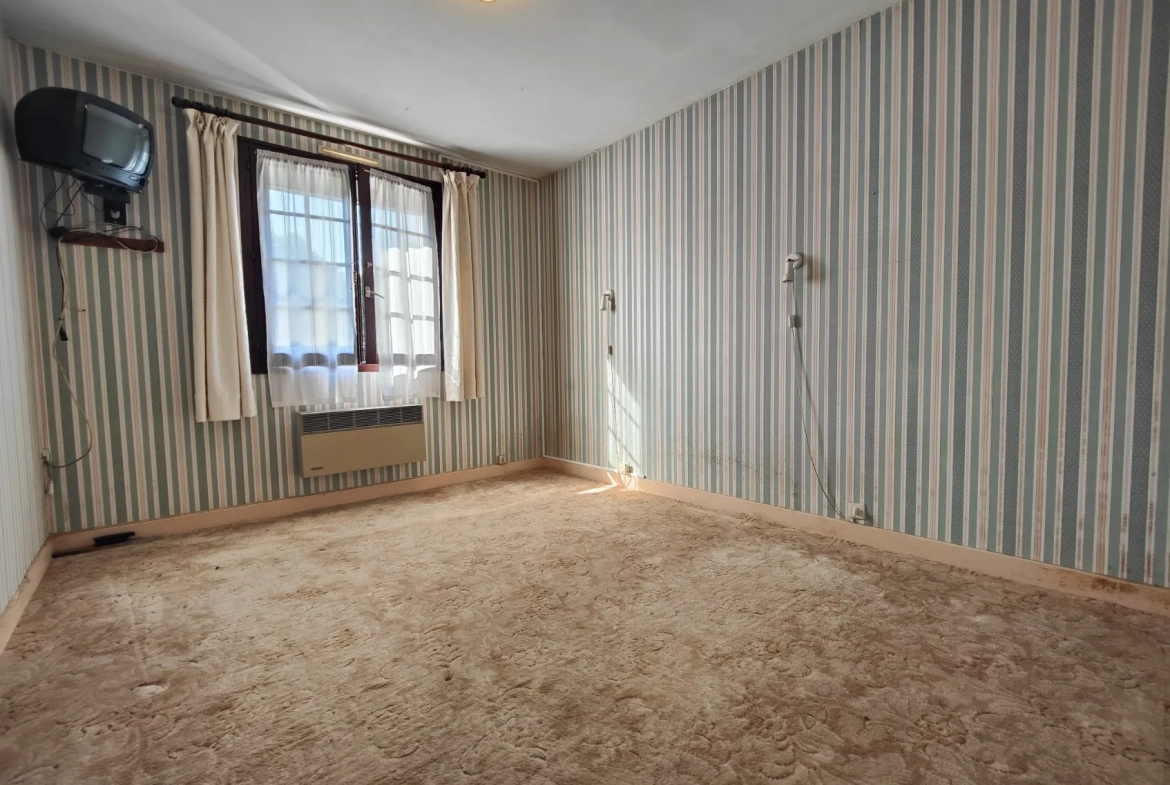Maison familiale à Charmoy avec grand potentiel et garage - 4 chambres 