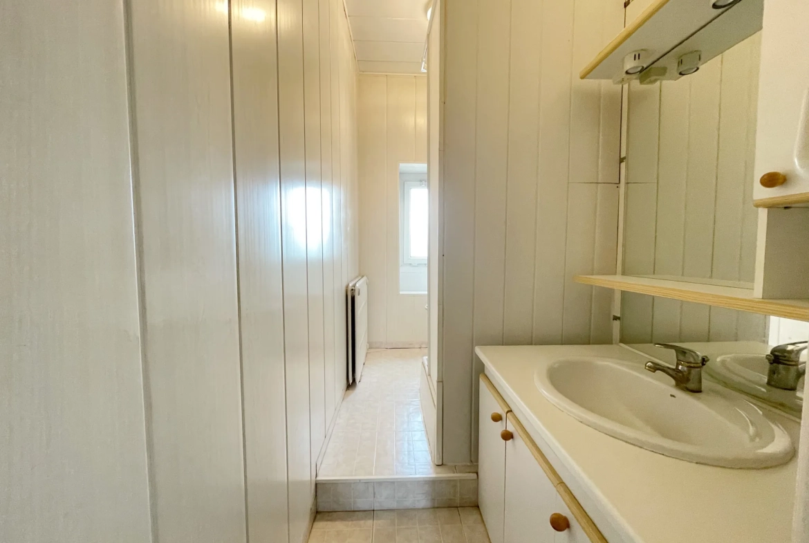 Charmante maison en bel étage à Roubaix avec jardin et garage, secteur Nouveau-Roubaix 