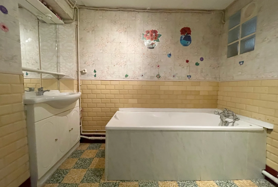 Charmante maison en bel étage à Roubaix avec jardin et garage, secteur Nouveau-Roubaix 