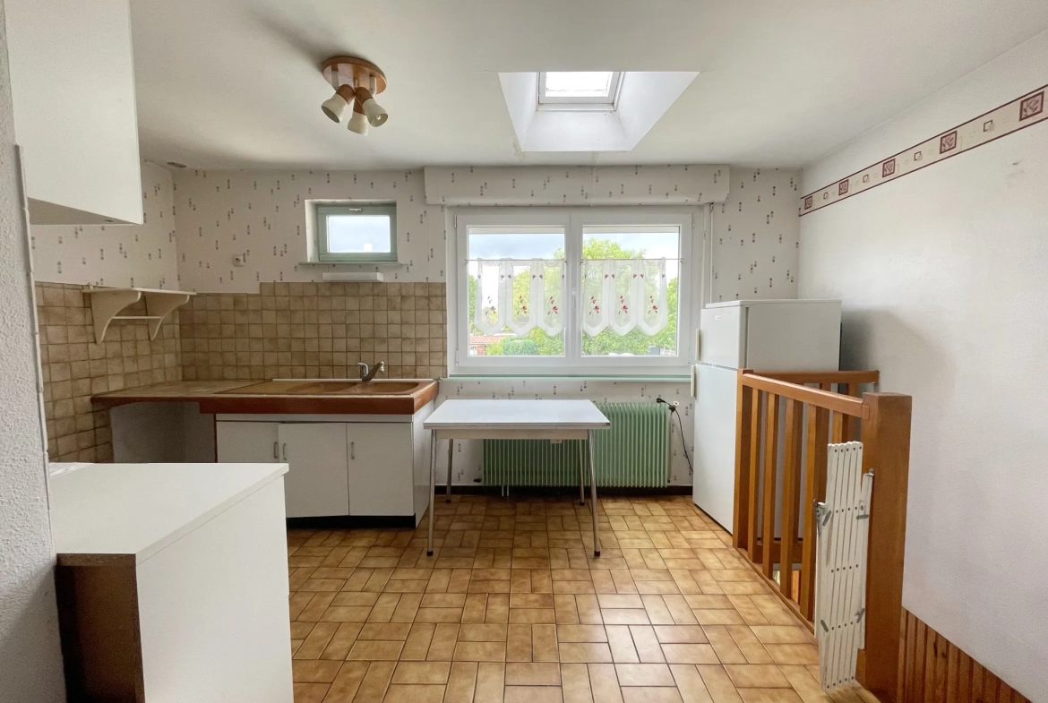Charmante maison en bel étage à Roubaix avec jardin et garage, secteur Nouveau-Roubaix 