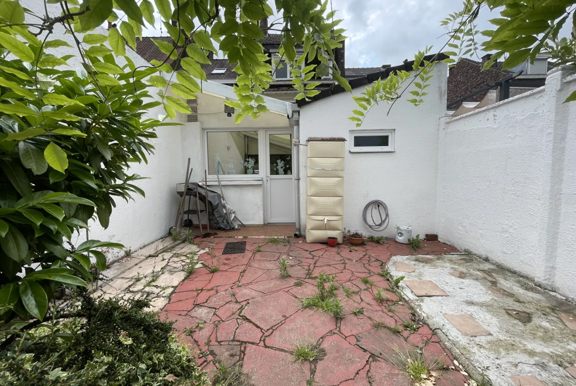 Charmante maison en bel étage à Roubaix avec jardin et garage, secteur Nouveau-Roubaix 