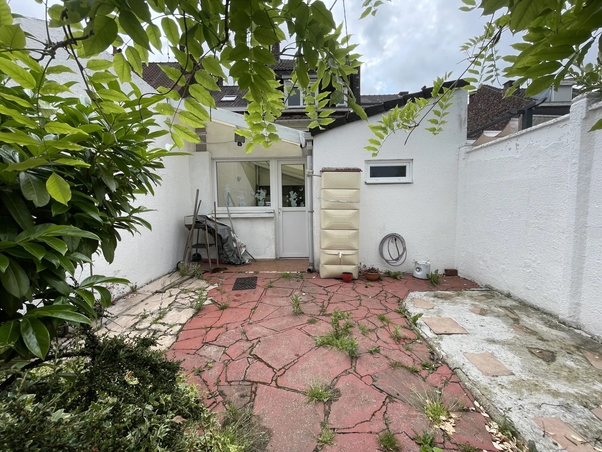 Charmante maison en bel étage à Roubaix avec jardin et garage, secteur Nouveau-Roubaix 