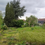 Terrain à bâtir de 800 m² avec hangar à Roncq, exposé sud, possibilité de permis en 2024