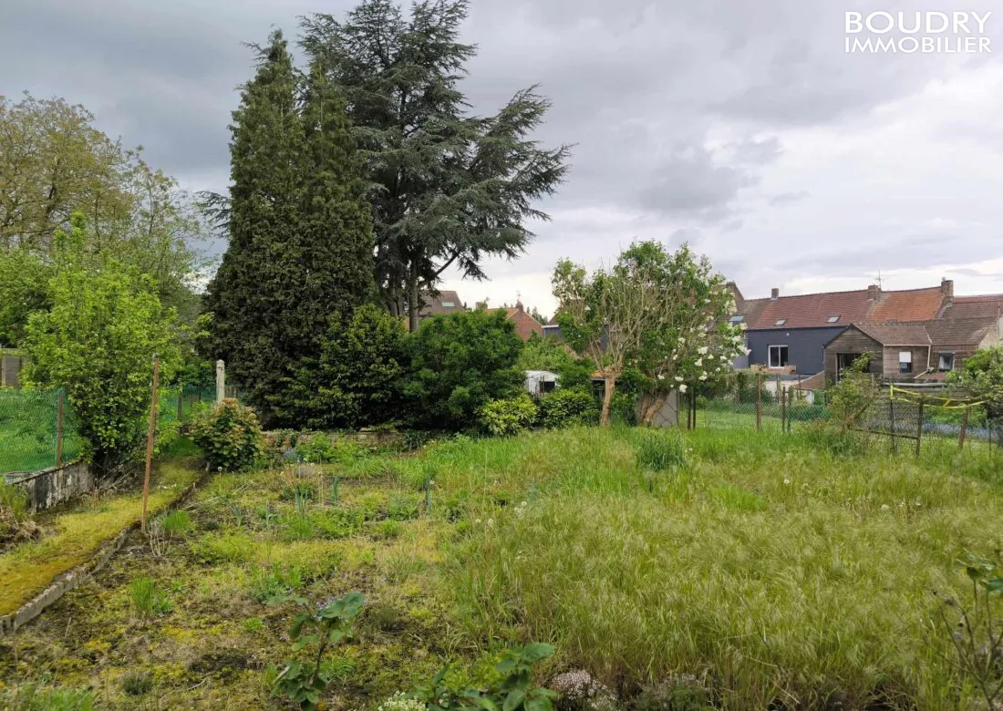 Terrain à bâtir de 800 m² avec hangar à Roncq, exposé sud, possibilité de permis en 2024 
