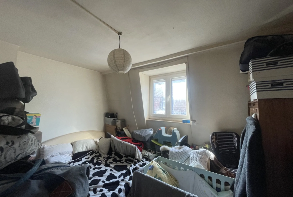 Belle maison à Roubaix avec potentiel d'agrandissement et cour intérieure 